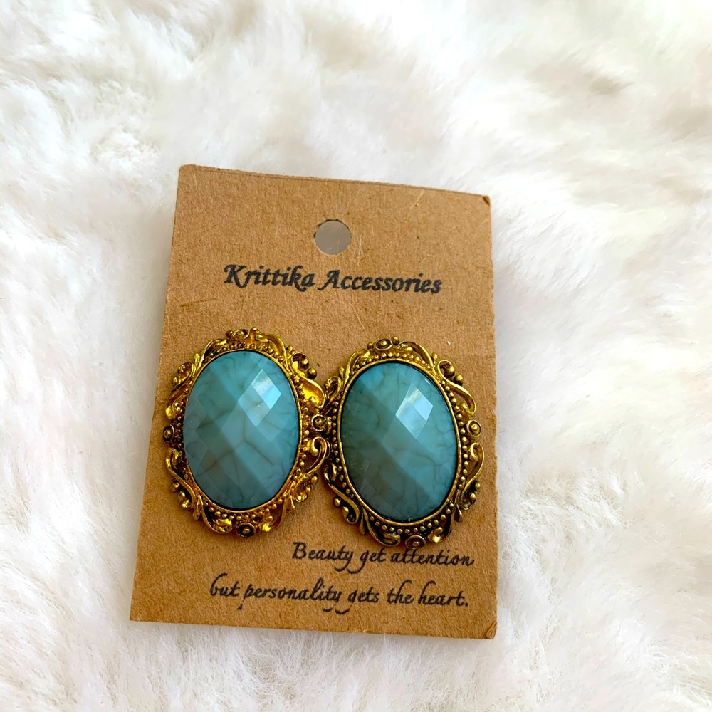 Beautiful light blue with gold earring